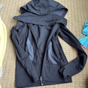 Lululemon size 2 greyish black jacket.  Excellent condition